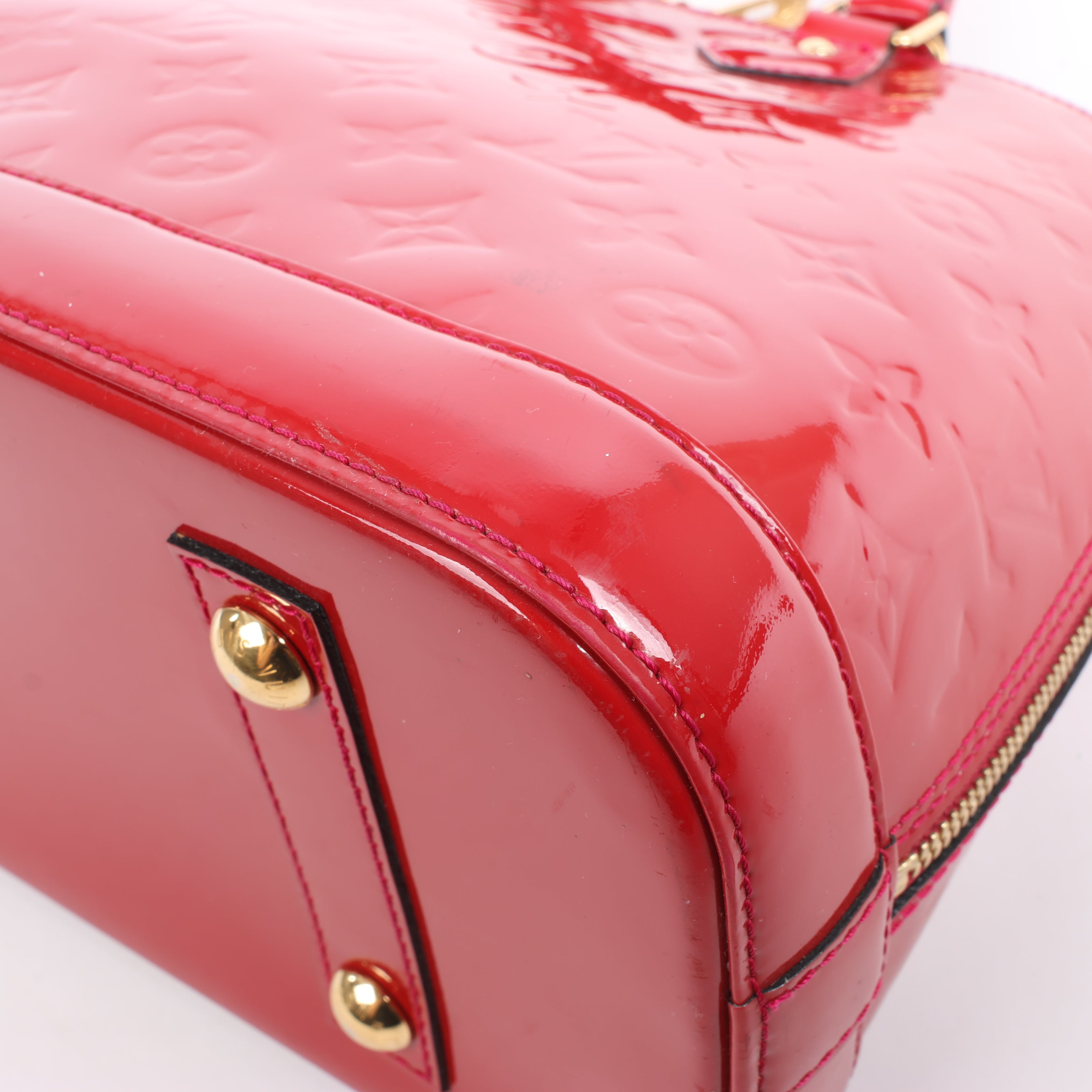 LOUIS VUITTON Vernis Alma PM Handbag in Red M91770