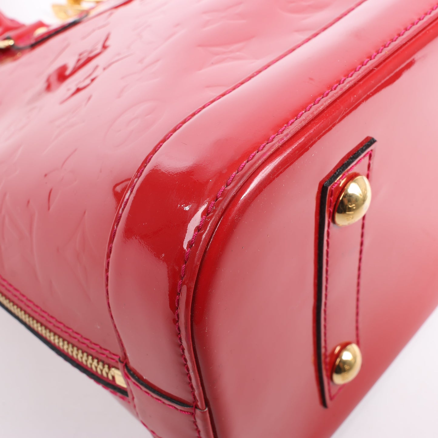LOUIS VUITTON Vernis Alma PM Handbag in Red M91770