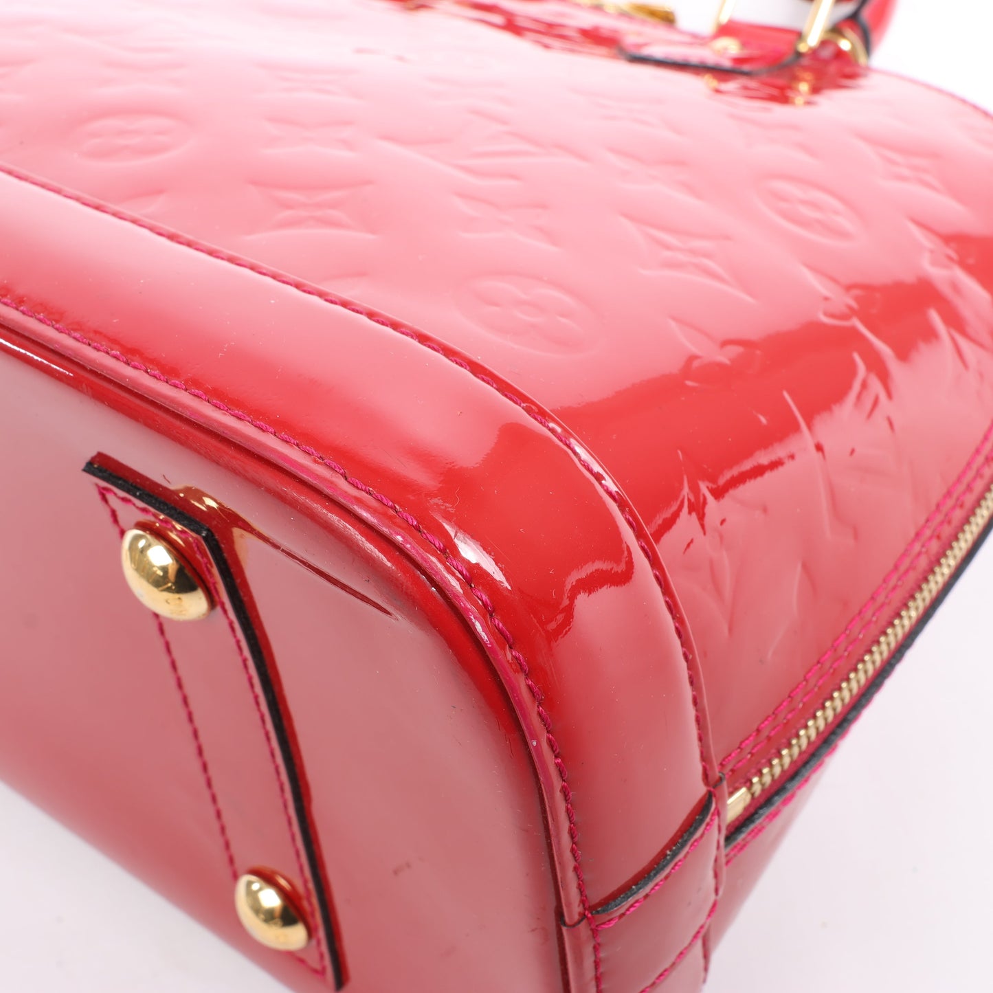 LOUIS VUITTON Vernis Alma PM Handbag in Red M91770
