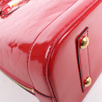 LOUIS VUITTON Vernis Alma PM Handbag in Red M91770