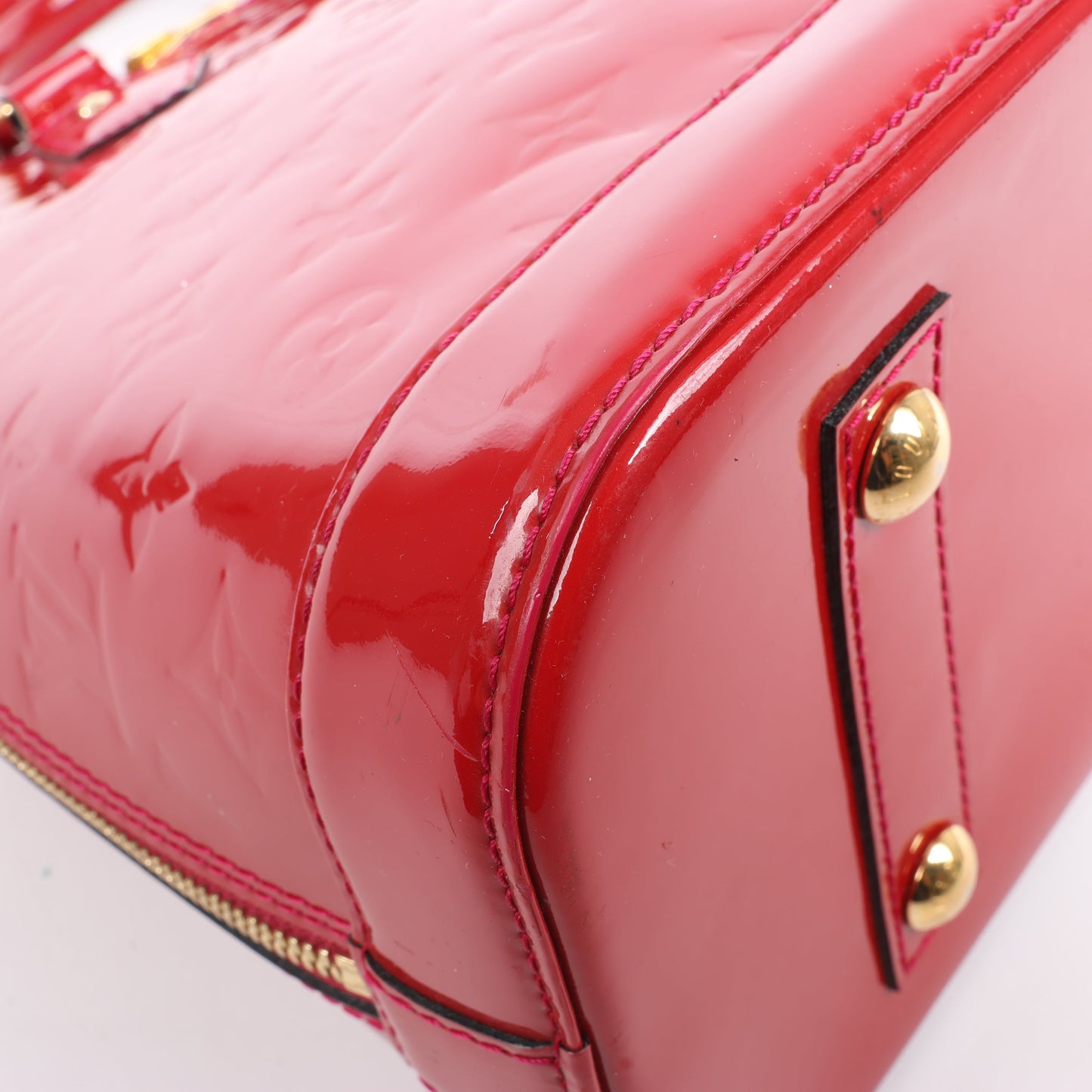 LOUIS VUITTON Vernis Alma PM Handbag in Red M91770