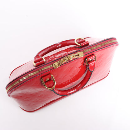 LOUIS VUITTON Vernis Alma PM Handbag in Red M91770