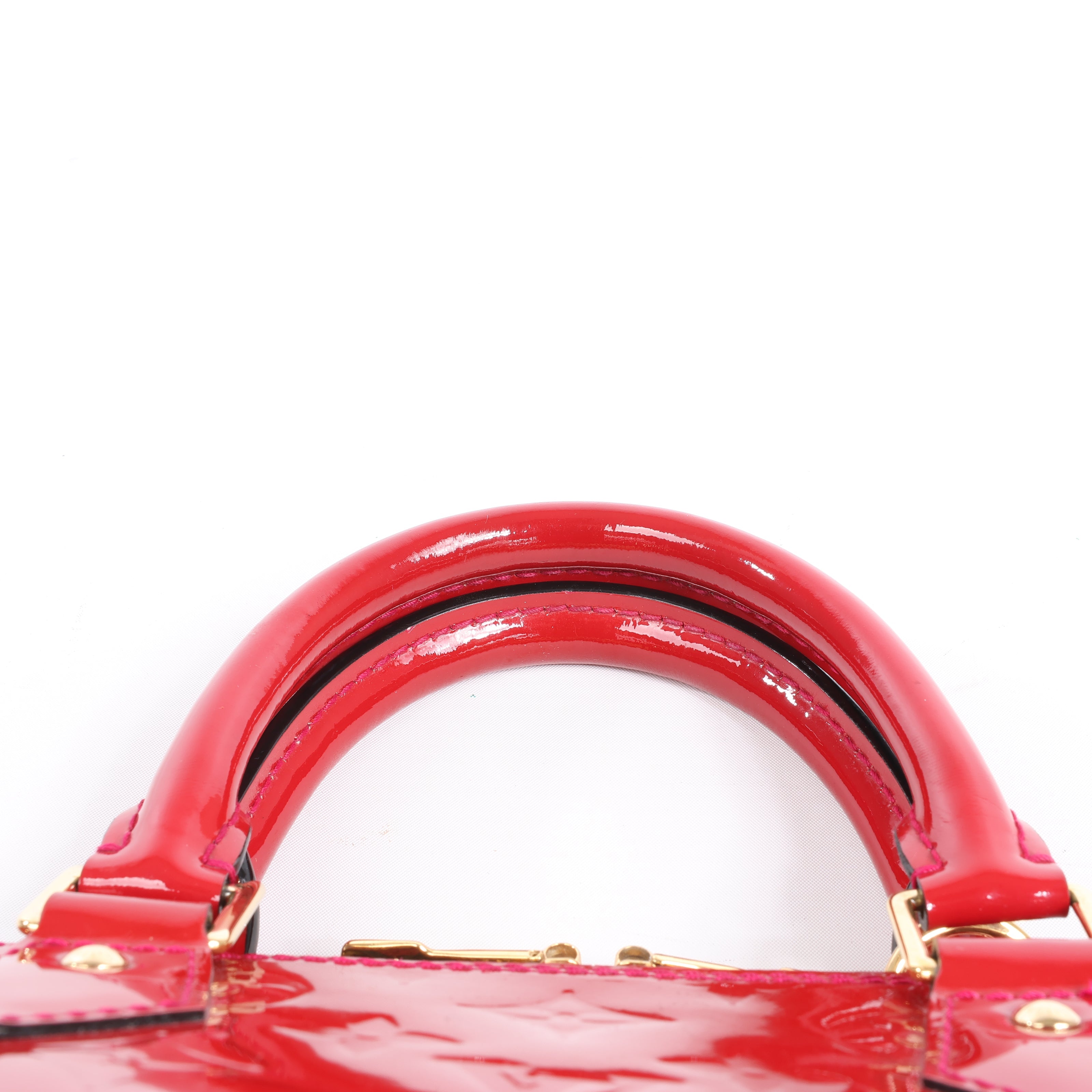 LOUIS VUITTON Vernis Alma PM Handbag in Red M91770