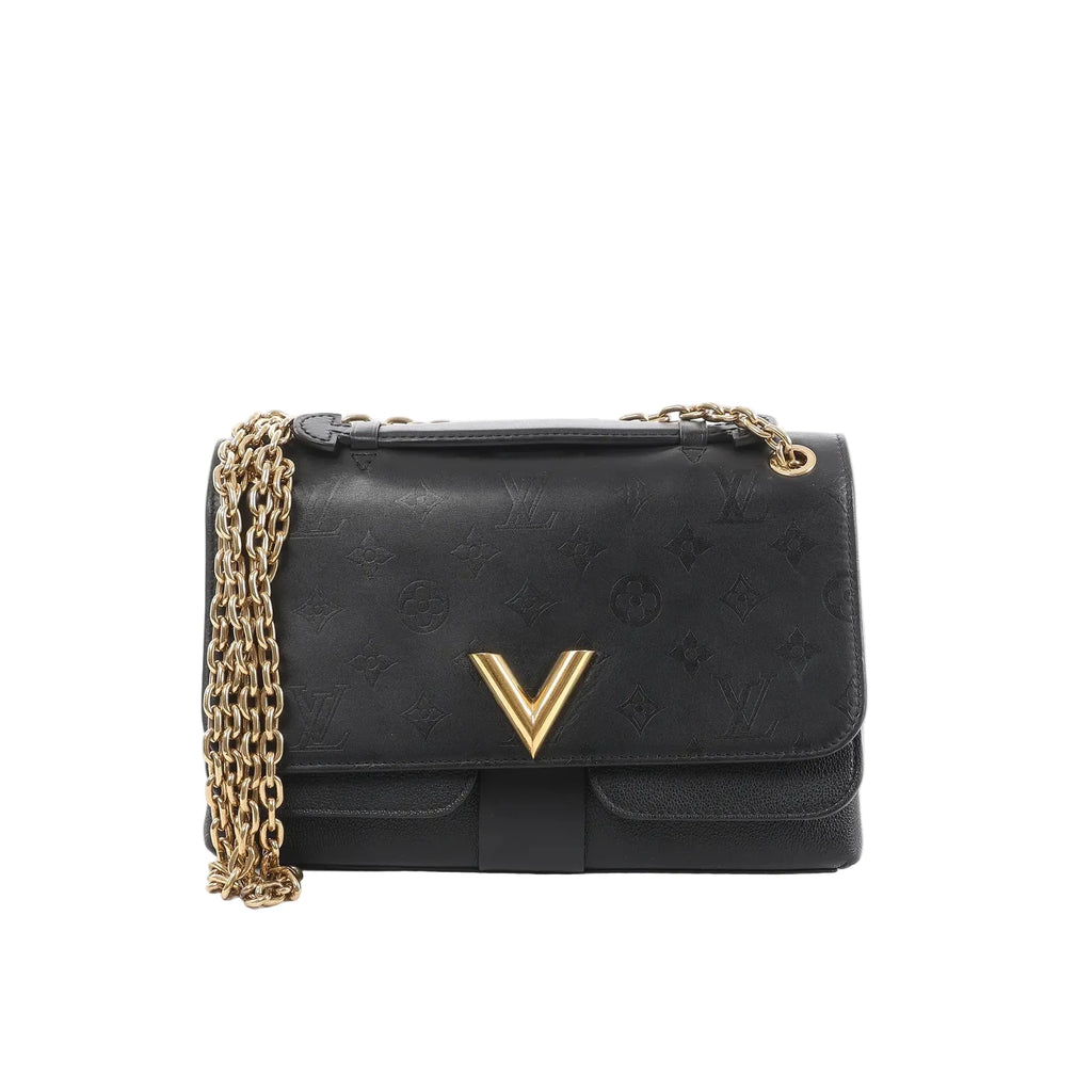 Black Louis Vuitton Very crossbody bag in embossed Monogram leather with gold-tone V logo on the flap and a gold chain shoulder strap.