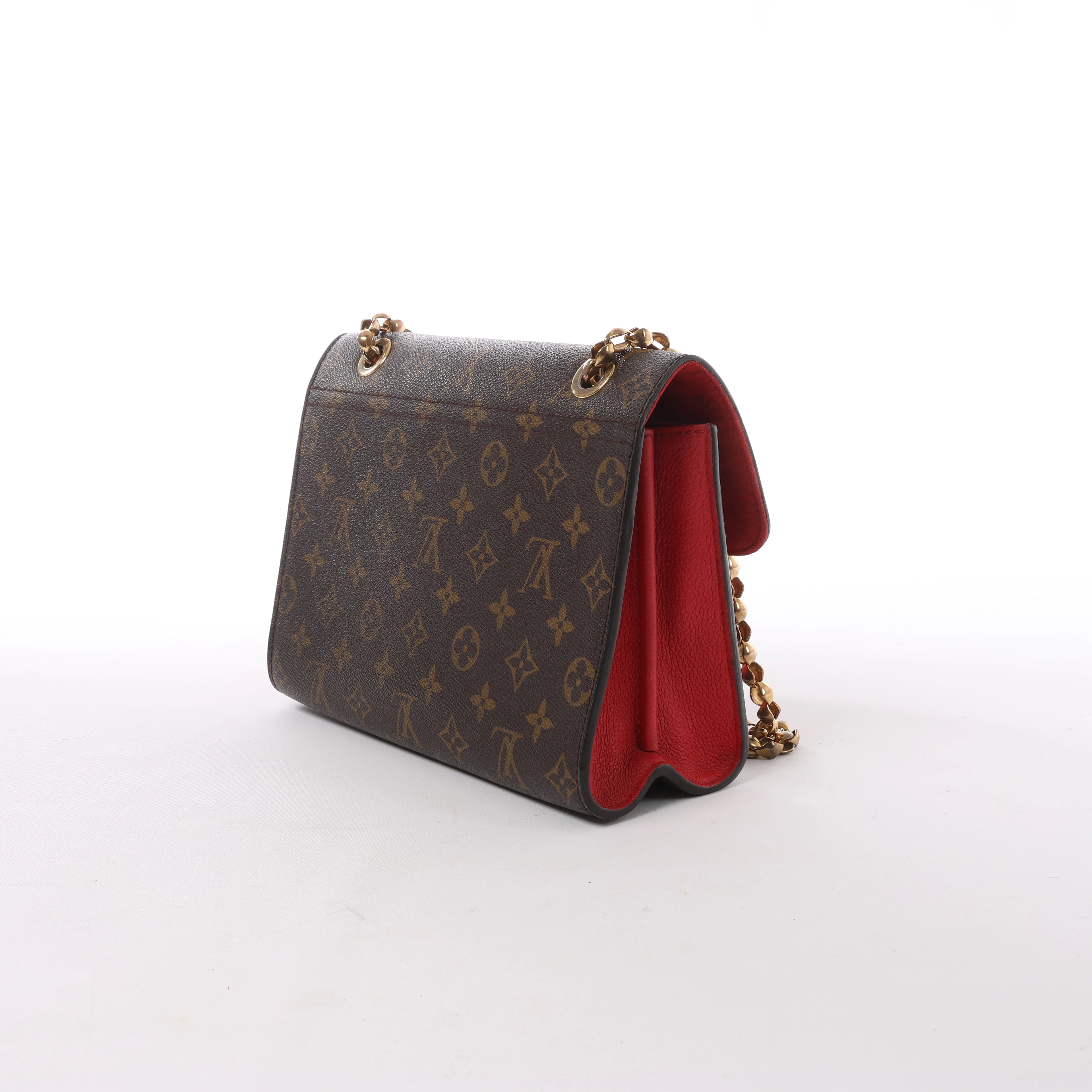Bolso bandolera Louis Vuitton Victoire Monogram de lona en rojo M41731