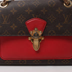 Bolso bandolera Louis Vuitton Victoire Monogram de lona en rojo M41731