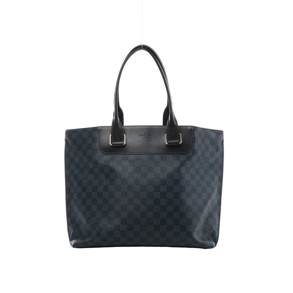 Navy blue Louis Vuitton Cabas Voyage tote in Damier Cobalt checkered canvas with black leather trim, long shoulder handles and silver-tone hardware.