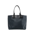 Navy blue Louis Vuitton Cabas Voyage tote in Damier Cobalt checkered canvas with black leather trim, long shoulder handles and silver-tone hardware.