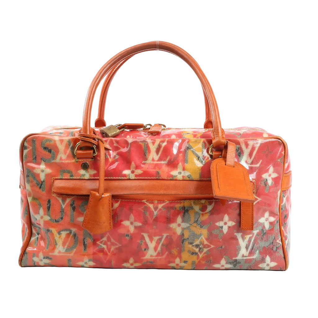 Louis Vuitton Weekender PM bag in Monogram Pulp canvas with vivid orange, red, and yellow graffiti-style print, featuring orange leather trim, dual top handles, luggage tag, and gold-tone hardware.
