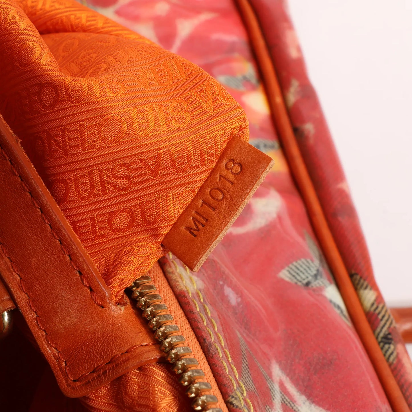 Louis Vuitton Weekender PM Monogram Pulp in Orange M95734