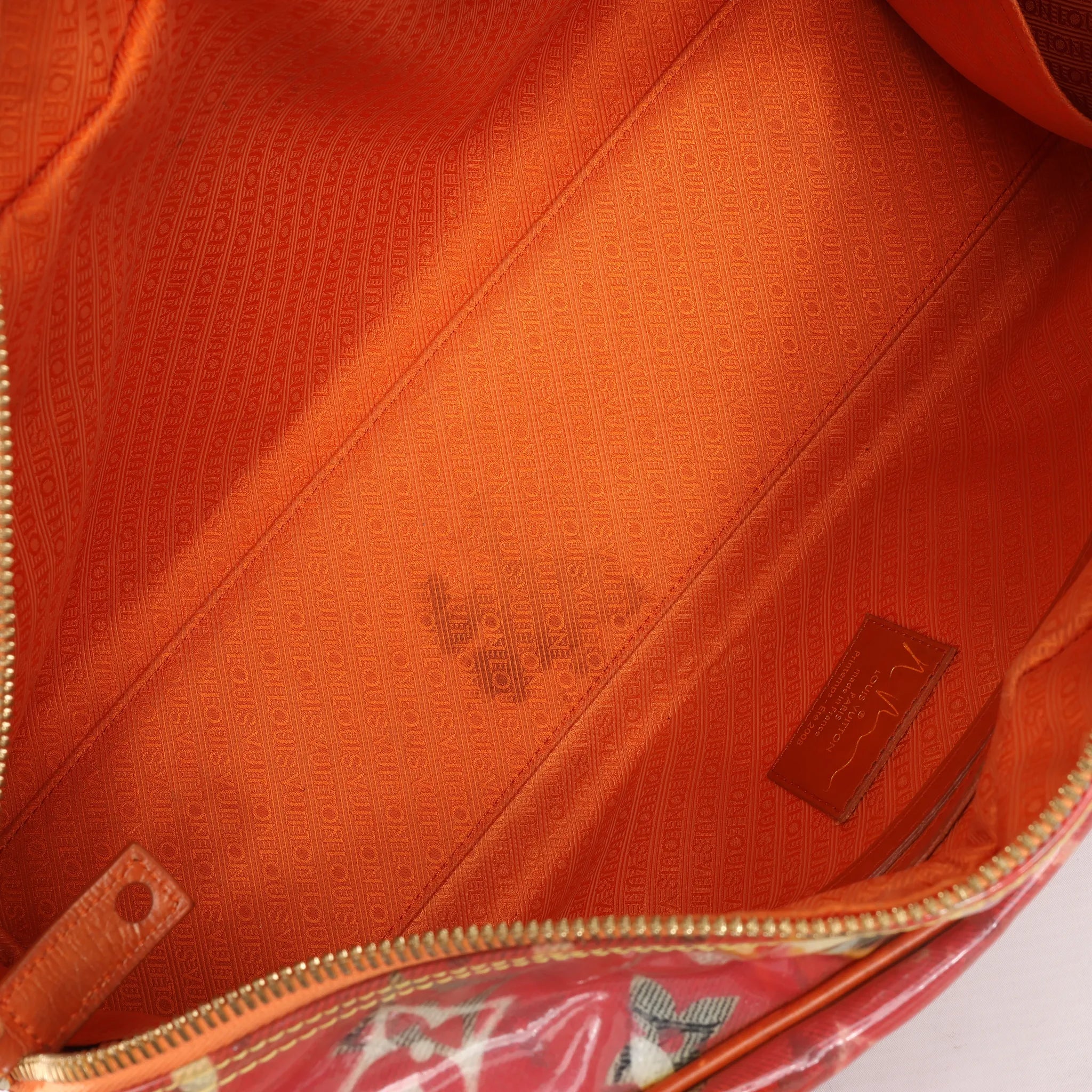 Louis Vuitton Weekender PM Monogram Pulp in Orange M95734