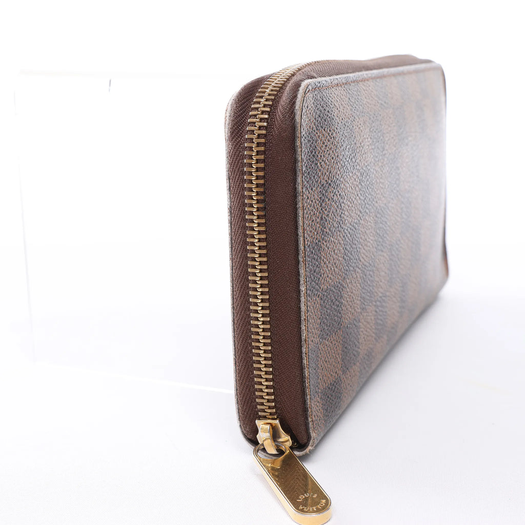 Louis Vuitton Zippy Damier Ebene Wallet in Brown N60003