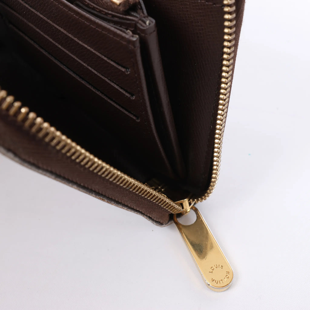 Louis Vuitton Zippy Damier Ebene Wallet in Brown N60003
