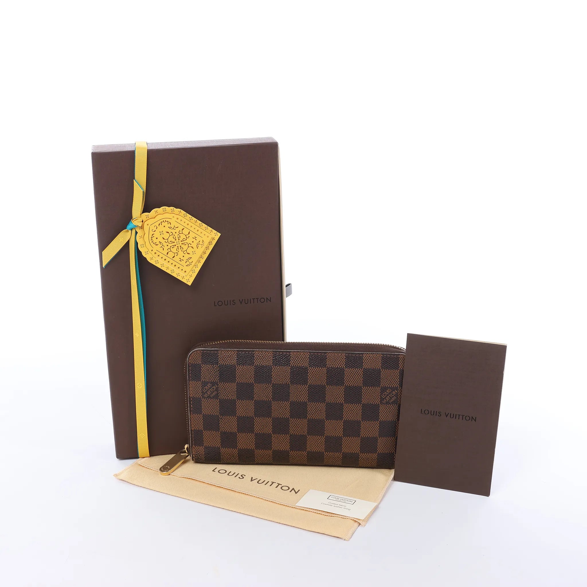 Louis Vuitton Zippy Damier Ebene Wallet in Brown N60003