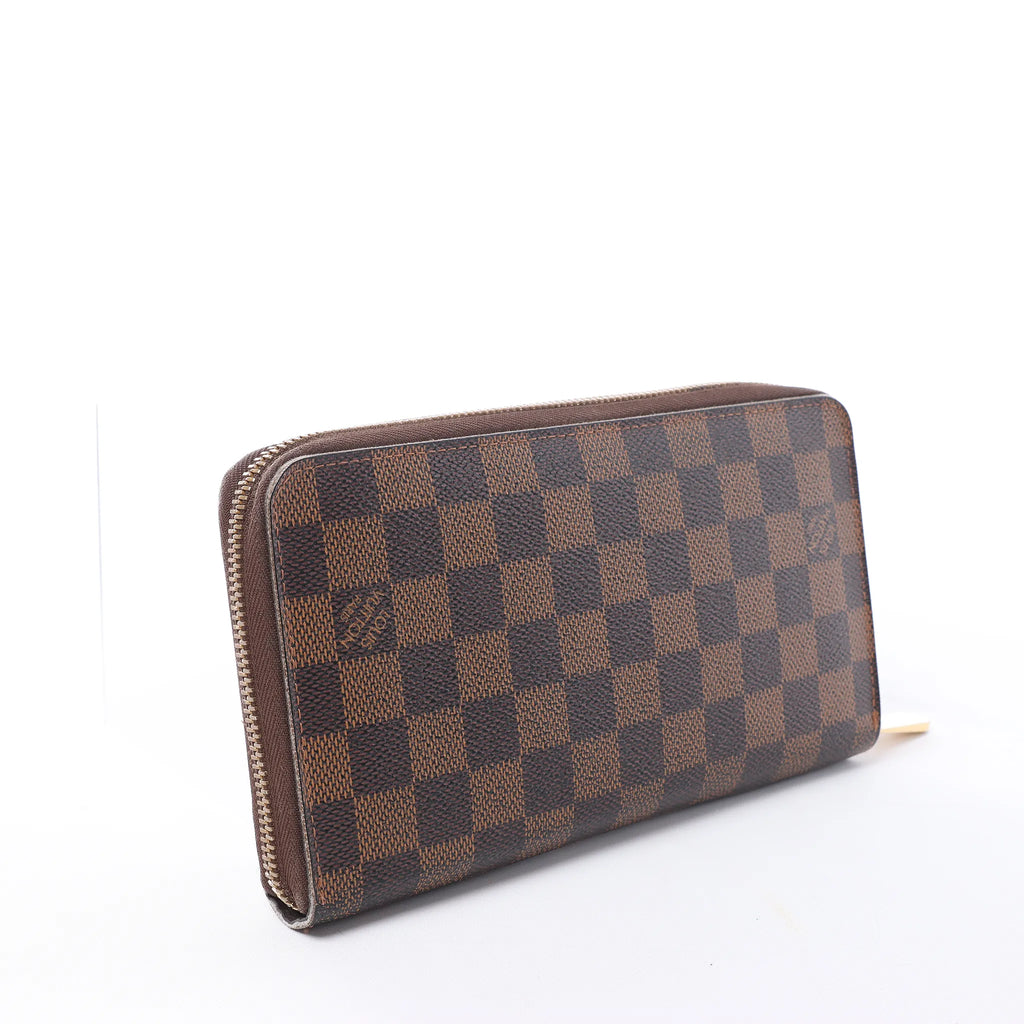 Louis Vuitton Zippy Damier Ebene Wallet in Brown N60003
