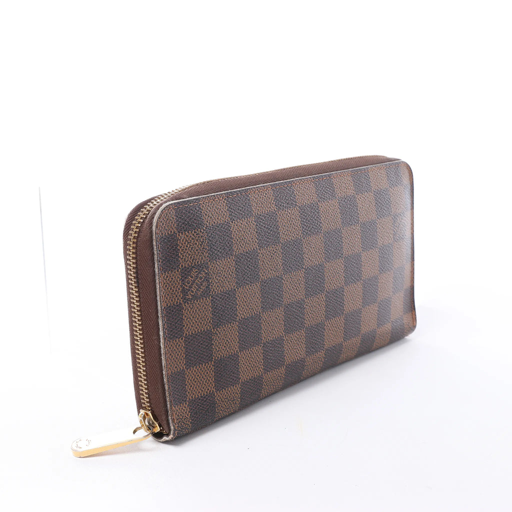 Louis Vuitton Zippy Damier Ebene Wallet in Brown N60003