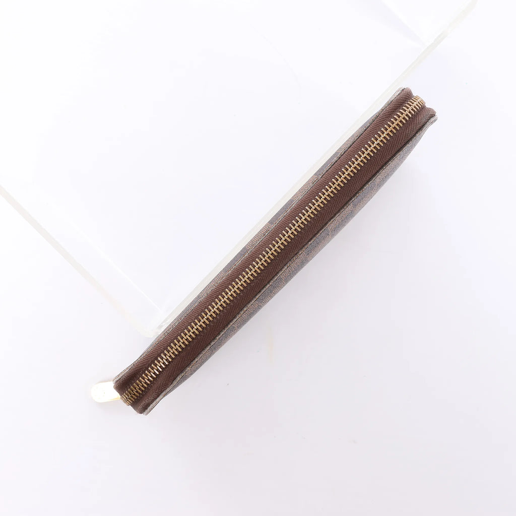Louis Vuitton Zippy Damier Ebene Wallet in Brown N60003