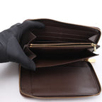 Louis Vuitton Zippy Damier Ebene Wallet in Brown N60003