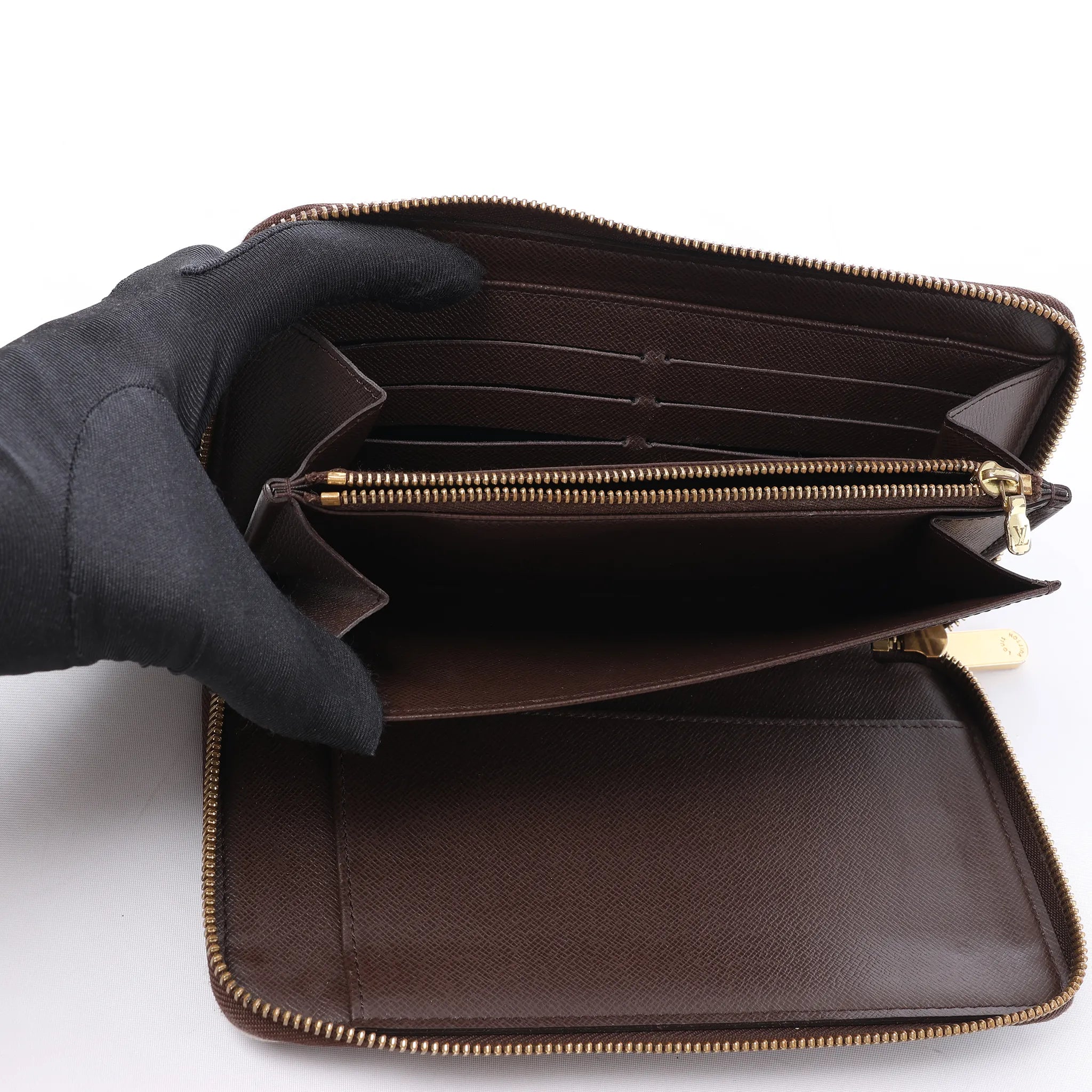 Louis Vuitton Zippy Damier Ebene Wallet in Brown N60003