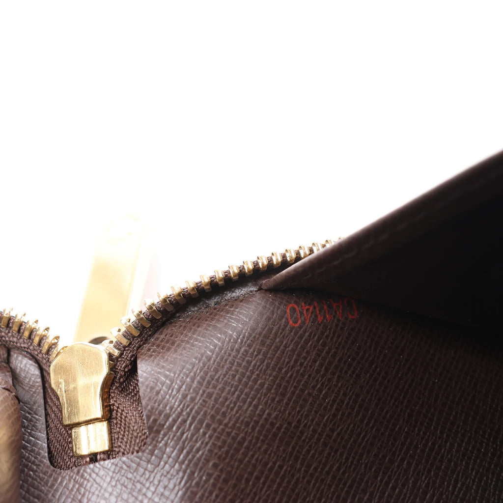 Louis Vuitton Zippy Damier Ebene Wallet in Brown N60003