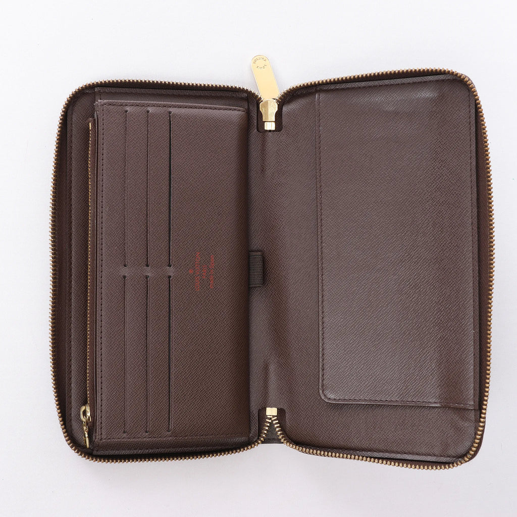 Louis Vuitton Zippy Damier Ebene Wallet in Brown N60003