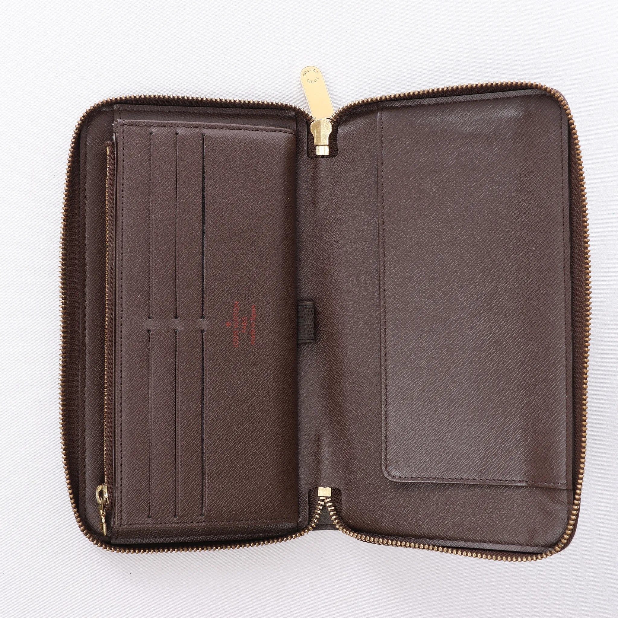 Louis Vuitton Zippy Damier Ebene Wallet in Brown N60003