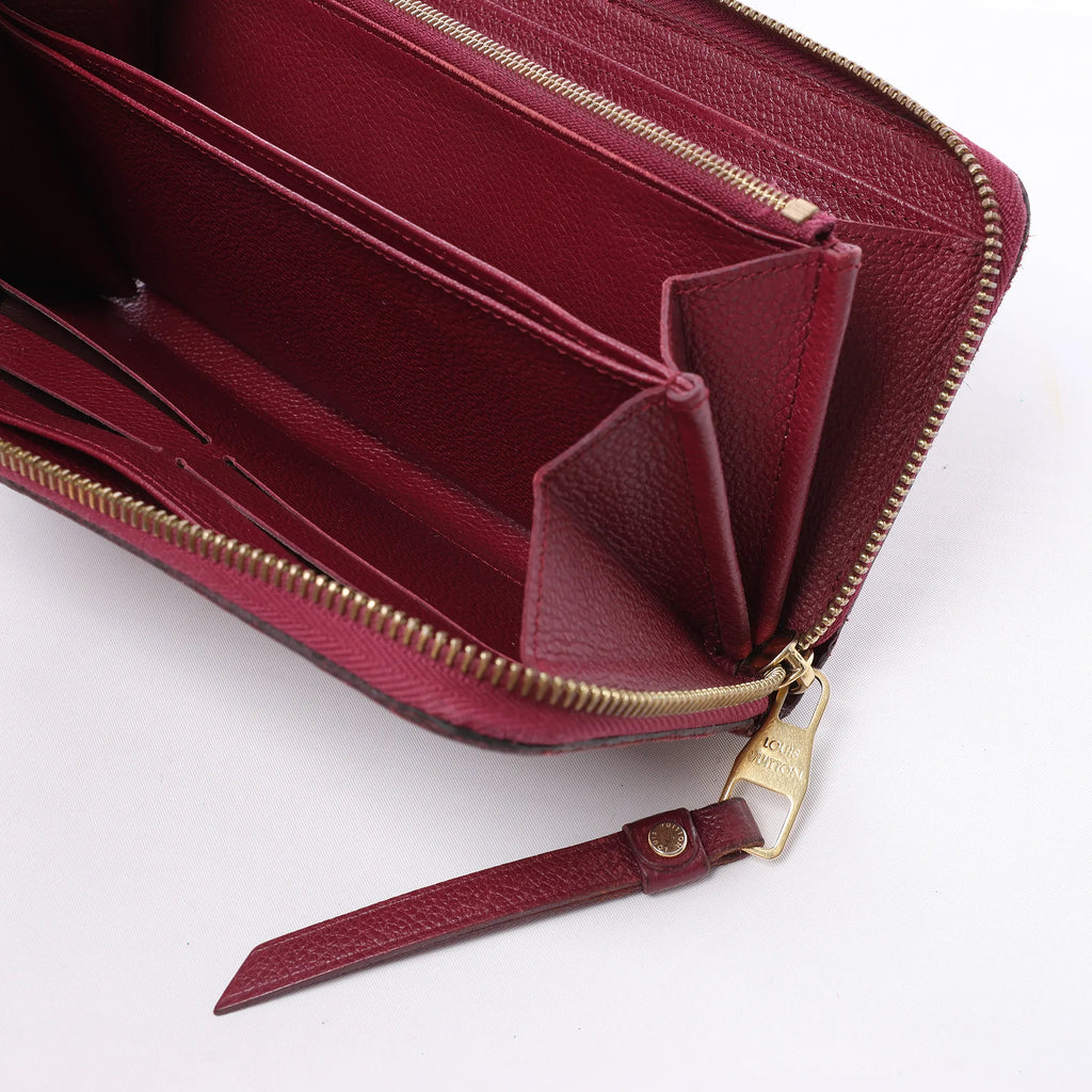 Louis Vuitton Zippy Empreinte Leather Wallet in Red M62214