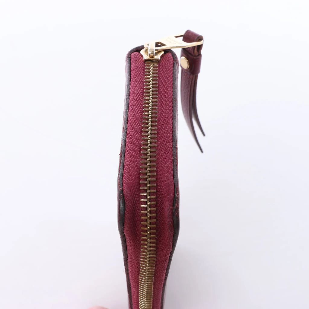 Louis Vuitton Zippy Empreinte Leather Wallet in Red M62214