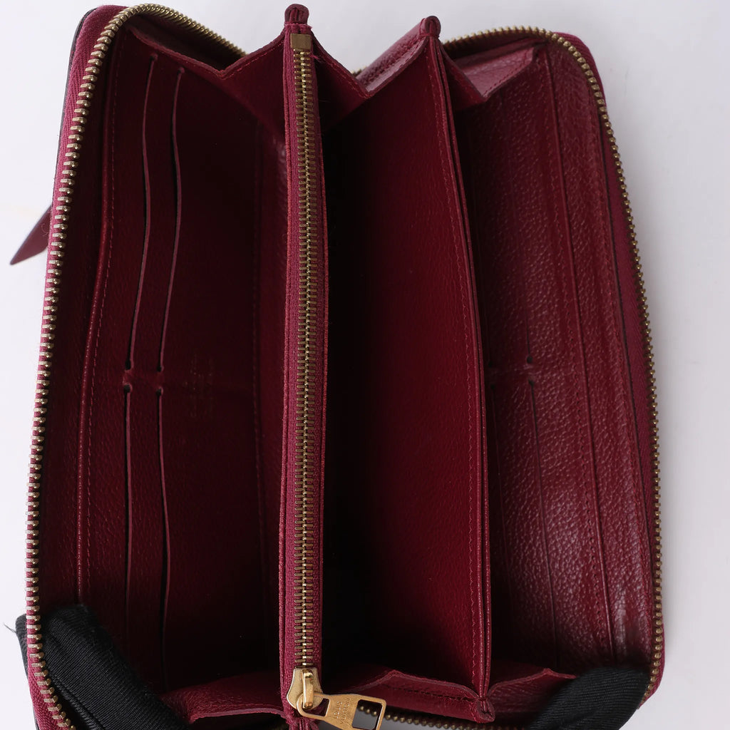 Louis Vuitton Zippy Empreinte Leather Wallet in Red M62214