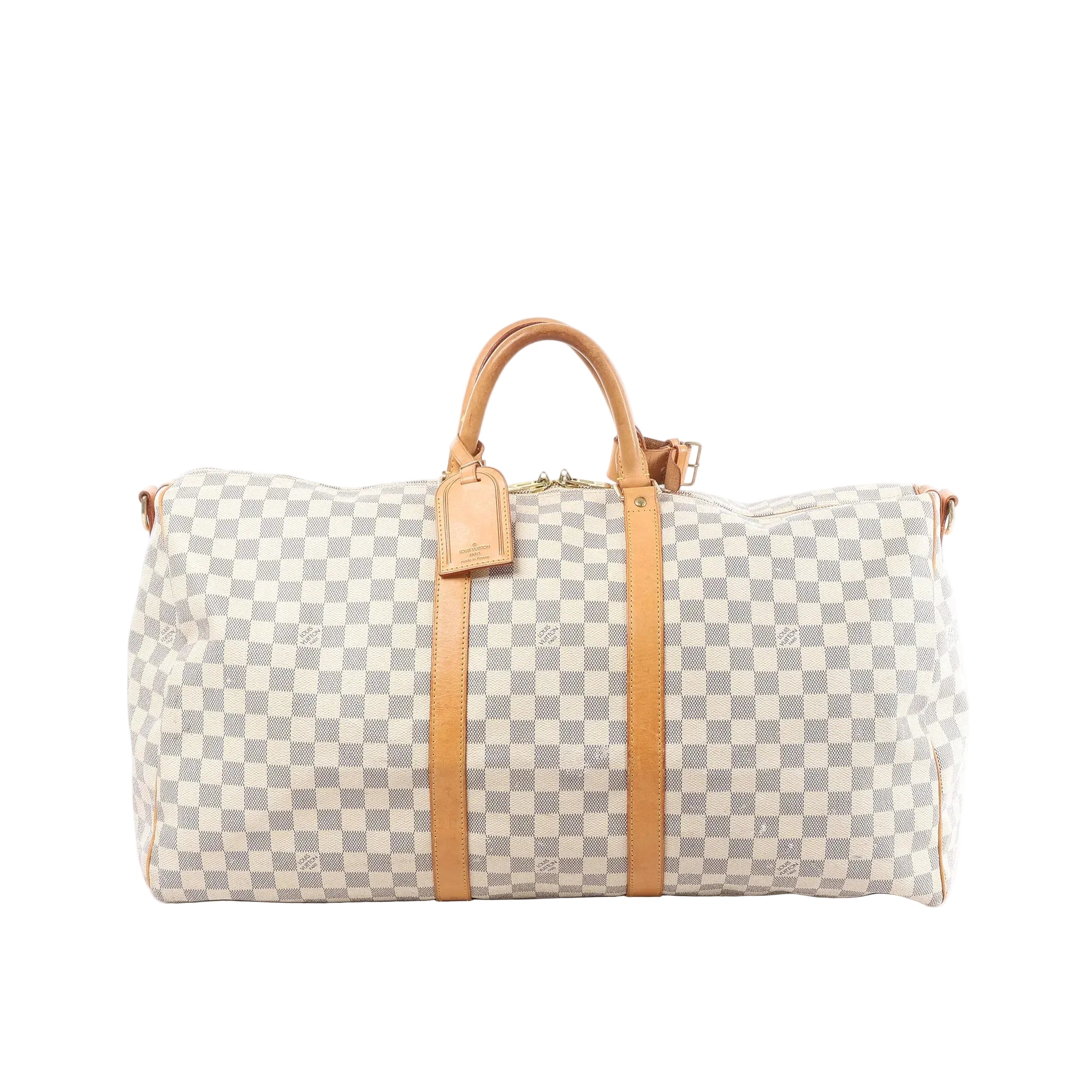 Louis Vuitton Damier Azur Keepall 55 travel bag with tan leather handles, vertical leather straps, luggage tag, and top zip on white background (shoulder strap not shown)