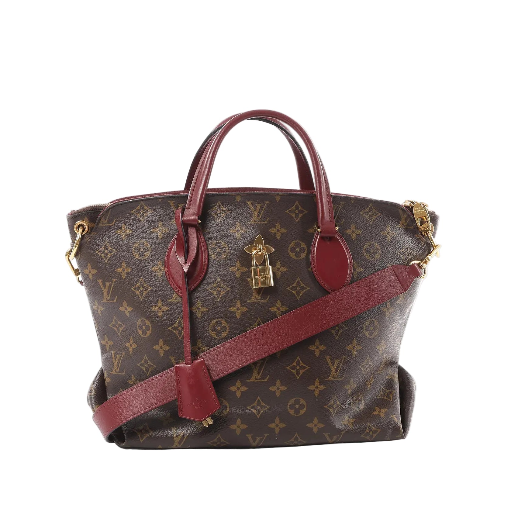Louis Vuitton Monogram canvas Flower MM tote bag with burgundy leather top handles and crossbody strap, gold-tone hardware, and padlock charm on front.