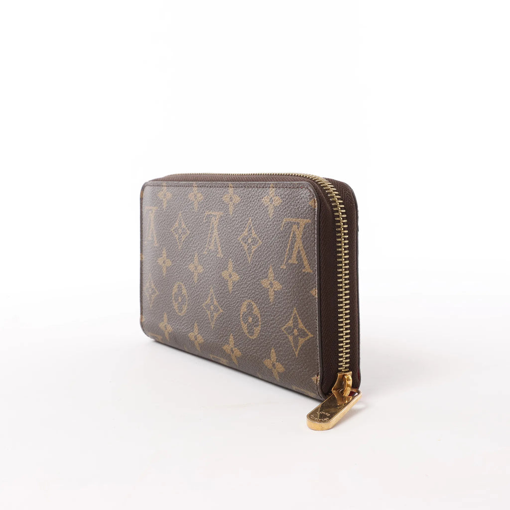 Louis Vuitton 2015 Christmas Animation Zippy Monogram Wallet in Brown x Pink CA3145