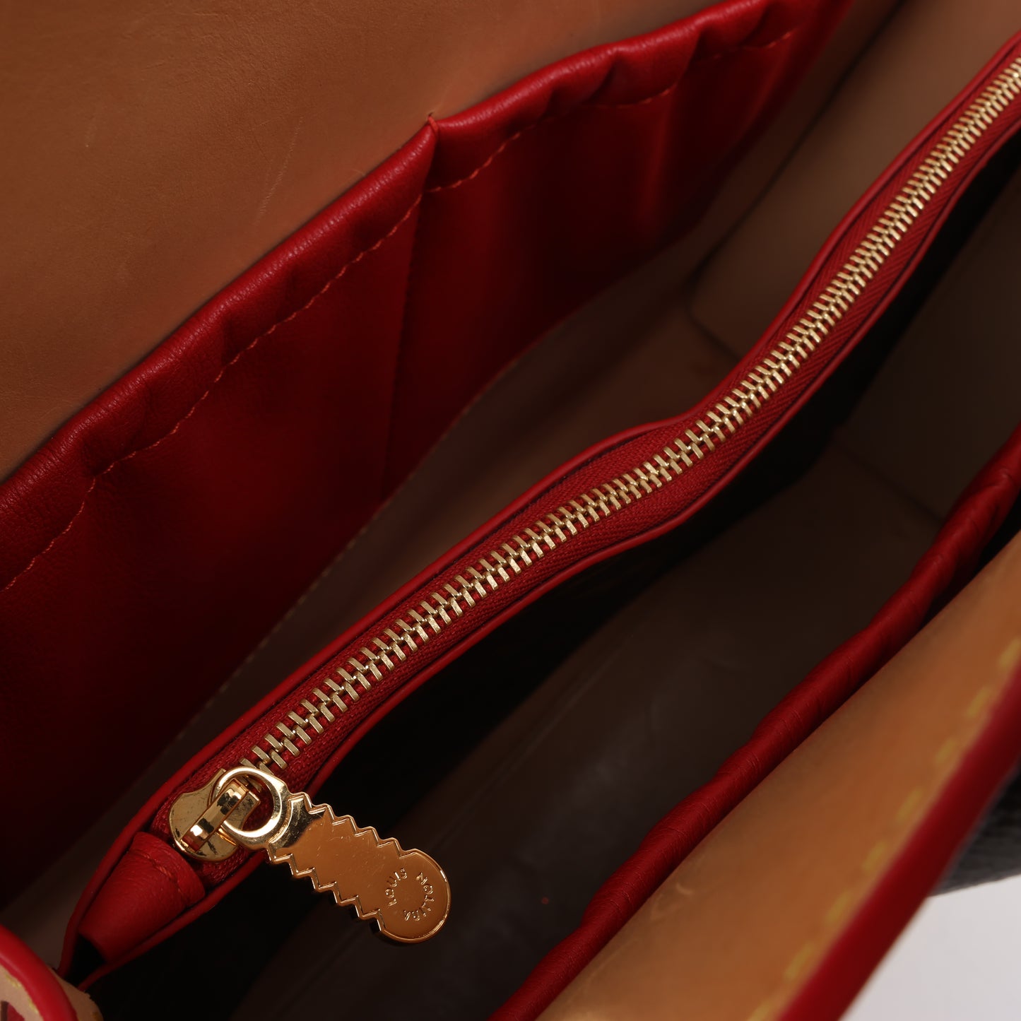 Sac à main Louis Vuitton x Christian Louboutin Monogram Iconoclast marron et rouge M41234