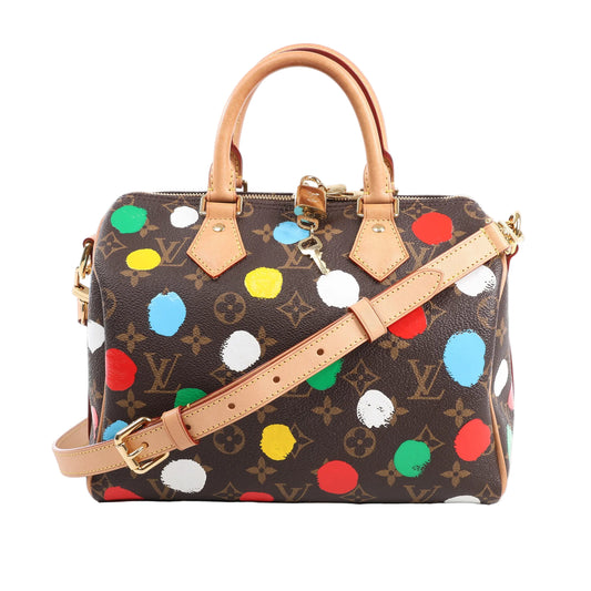 Louis Vuitton x Yayoi Kusama Speedy Bandoulière 25 handbag in brown monogram canvas with multicolor painted dots, natural leather handles, and adjustable strap, shown front-facing against a white background.