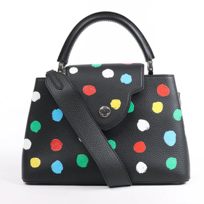 Sac à main Louis Vuitton x Taurillon Capucines MM 2 en 1 noir M21663