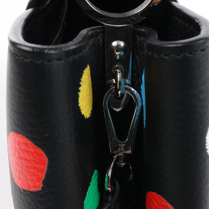 Sac à main Louis Vuitton x Taurillon Capucines MM 2 en 1 noir M21663