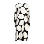 Marni cream and black printed crepe midi dress with long sleeves, round neckline and oversized abstract oval print, displayed against a white background.