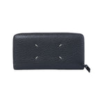 Maison Margiela black textured leather zip-around wallet with four white signature stitches and black zipper pull.
