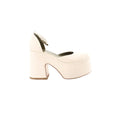 Beige Maria Luca Giulia platform slingback shoe with rounded toe, chunky block heel, and ankle strap, side view on a white background.
