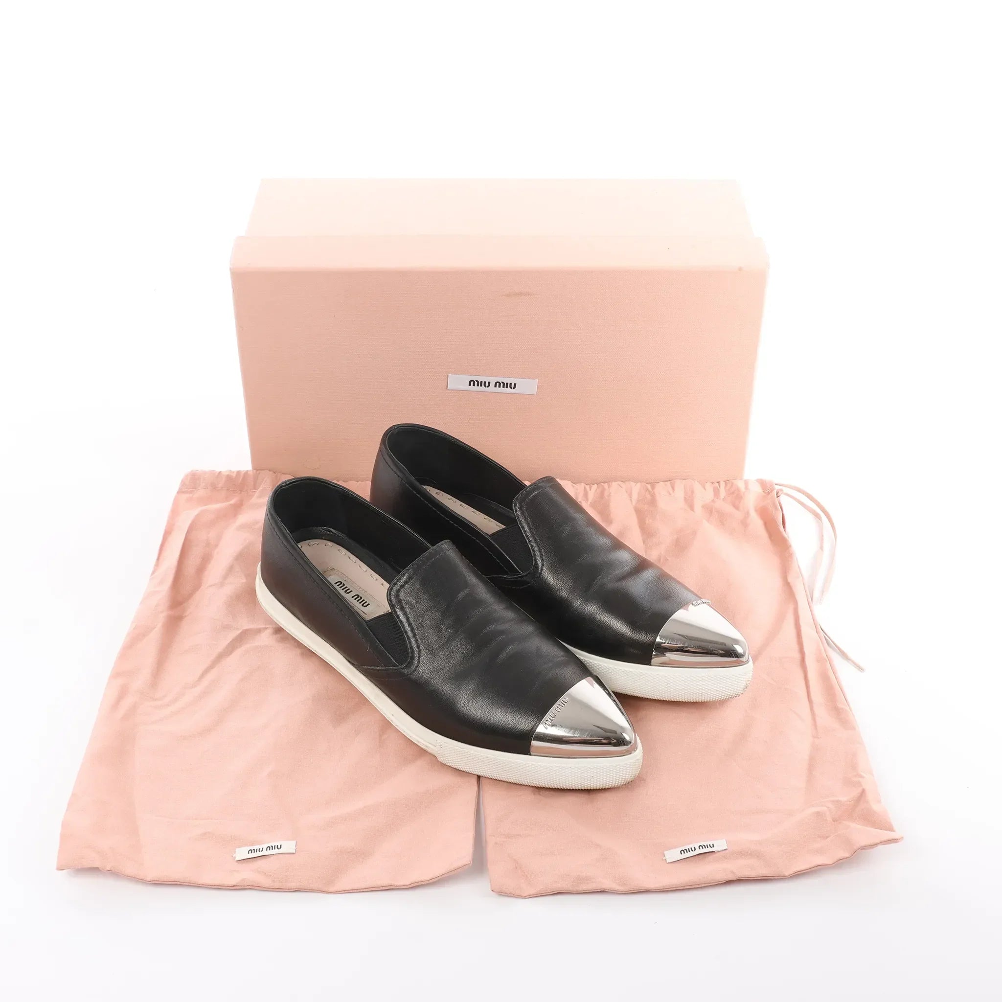 Miu Miu Leather Slip-on in Black 5S9010, Size 38.5 EU
