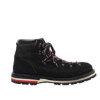 Side view of a black Moncler ankle boot with a hair-textured upper, metal lace hooks, tricolour laces and a lugged sole with striped heel detailing.