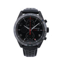 Montblanc TimeWalker black chronograph watch with black dial, red accents, 24-hour scale and perforated black strap.