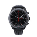 Montblanc TimeWalker black chronograph watch with black dial, red accents, 24-hour scale and perforated black strap.