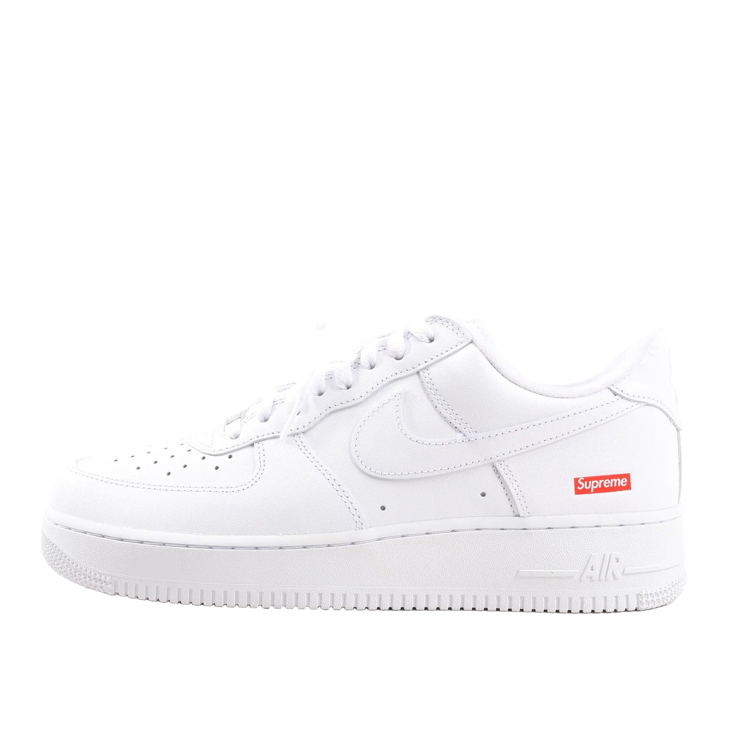 Nike x Supreme Air Force 1 Low SP sneaker in white leather, side view showing perforated toe box, Swoosh logo, and red Supreme box logo on the heel, EU size 43.