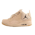 Side view of a beige Nike Jordan Courtside sneaker in size 42.5 EU, made from suede and mesh fabric, featuring lace-up design, cushioned sole with visible air unit, and black Jumpman logo on the heel panel, set against a white background.