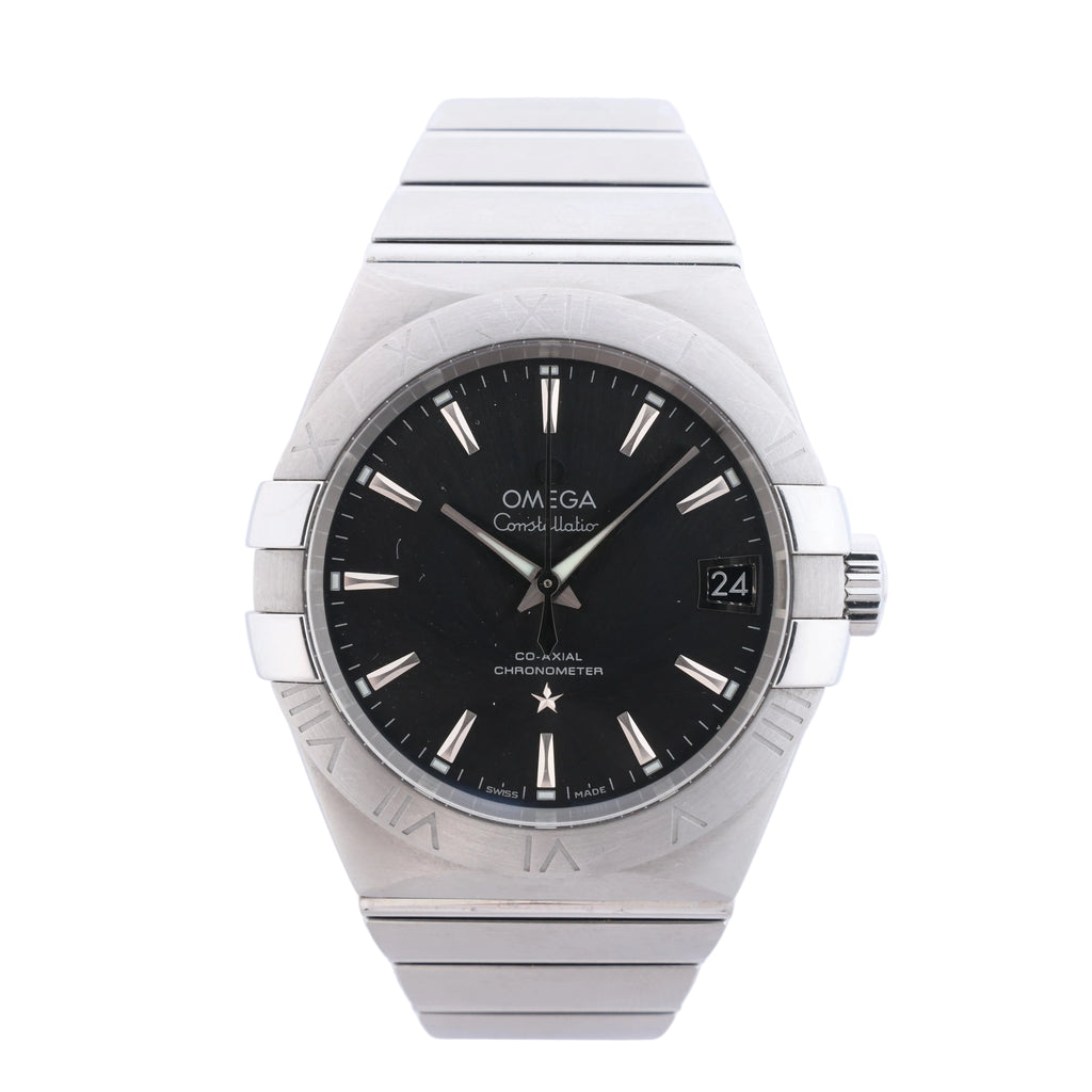 Omega Constellation stainless steel watch with gray dial, date window, Roman-numeral bezel and integrated metal bracelet.