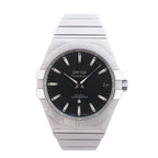Omega Constellation stainless steel watch with gray dial, date window, Roman-numeral bezel and integrated metal bracelet.