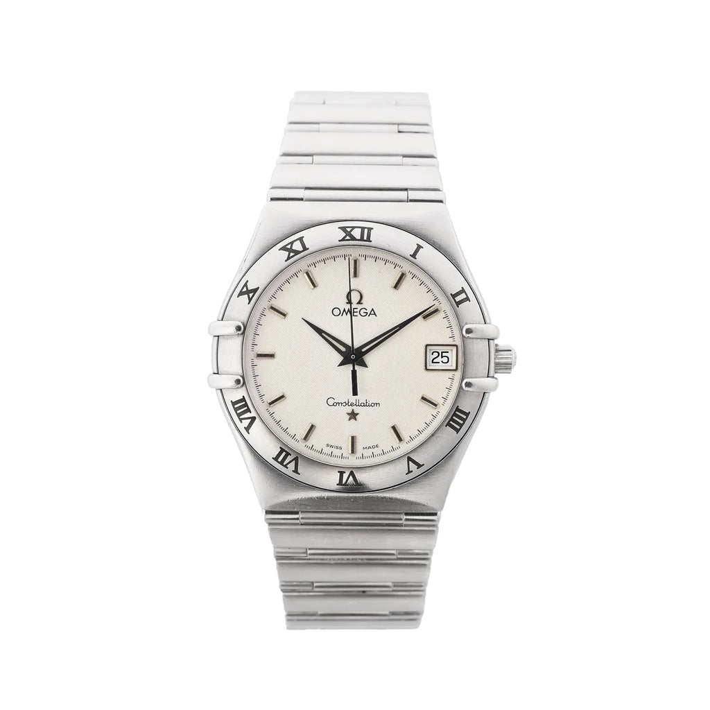Omega Constellation stainless steel watch with silver-toned dial, Roman numeral bezel, date window at 3 o’clock, baton hour markers, and stainless steel bracelet.
