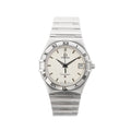 Omega Constellation stainless steel watch with silver-toned dial, Roman numeral bezel, date window at 3 o’clock, baton hour markers, and stainless steel bracelet.