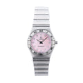 Omega Constellation stainless steel watch with pink mother-of-pearl dial, diamond hour markers, Roman numeral bezel, and bracelet strap on white background.